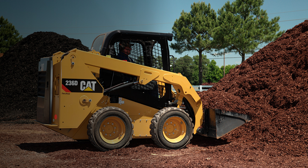 Caçambas - Minicarregadeira